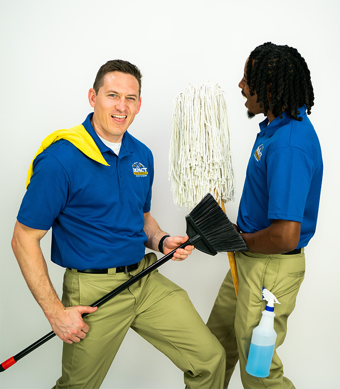Two Men Cleaning Service Team Having Fun